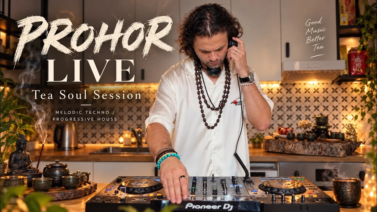 Prohor preparing tea and playing a set in his kitchen